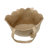 This all-natural jute tote is finished with a pretty scallop edge to add a touch of sweetness to this roomy tote. Perfect to carry your summer essentials to the beach, the farmers market or wherever your next adventure leads.

Dimensions: 11.5 in. H x 19 in. W x 6.5 in. D
Open topShoulder straps: 11 in. drop
Brass plated hardware
100% Natural Jute
Unlined