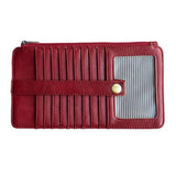 This slim and sleek wallet has nine credit card pockets, each with a snap tab for security and brass-plated hardware. It also has an ID window, zippered change pocket, and zippered billfold pocket in a crimson red vegan leather.


DIMENSIONS: 3.75 IN. H X 7.25 IN. W X .25 IN. D&nbsp;


100% Vegan leather (polyurethane)