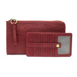 The Karina combines sleek styling with uber organization in beautiful antique-looking cranberry vegan leather! This bag is the ultimate versatility, as it can be worn as a crossbody, a clutch, or a wristlet. The bonus wallet, which includes credit card slots, ID windows, a zippered change pocket, and a billfold, will keep you organized on the go and can be carried separately!


MAIN BAG: 9"H x 6"W x 1"D



Removable and adjustable crossbody strap 21"-26" with lobster claw clasps

Removable long wristlet str