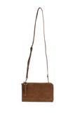 Karina combines sleek styling with uber organization in a beautiful faux suede walnut leather. The ultimate in versatility, this bag can be worn as a crossbody, carried as a clutch or as a wristlet. The included bonus wallet with credit card slots, ID windows, zippered change pocket and billfold will keep your organized on the go and can be carried separately.


Product Details
Main Bag
Dimensions: 9.75 in. W x 6 in. H x 1 in. D
Zippered Top Closure
Exterior Open Pocket
Interior Zipper Pocket
Detachable 7 i