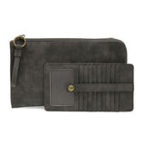Karina combines sleek styling with uber organization in a beautiful faux suede shadow leather. The ultimate in versatility, this bag can be worn as a crossbody, carried as a clutch or as a wristlet. The included bonus wallet with credit card slots, ID windows, zippered change pocket and billfold will keep your organized on the go and can be carried separately.


Product Details
Main Bag
Dimensions: 9.75 in. W x 6 in. H x 1 in. D
Zippered Top Closure
Exterior Open Pocket
Interior Zipper Pocket
Detachable 7 i