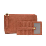 Karina combines sleek styling with uber organization in a beautiful faux suede spice leather. The ultimate in versatility, this bag can be worn as a crossbody, carried as a clutch or as a wristlet. The included bonus wallet with credit card slots, ID windows, zippered change pocket and billfold will keep your organized on the go and can be carried separately.


Product Details
Main Bag
Dimensions: 9.75 in. W x 6 in. H x 1 in. D
Zippered Top Closure
Exterior Open Pocket
Interior Zipper Pocket
Detachable 7 in