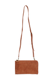 Karina combines sleek styling with uber organization in a beautiful faux suede spice leather. The ultimate in versatility, this bag can be worn as a crossbody, carried as a clutch or as a wristlet. The included bonus wallet with credit card slots, ID windows, zippered change pocket and billfold will keep your organized on the go and can be carried separately.


Product Details
Main Bag
Dimensions: 9.75 in. W x 6 in. H x 1 in. D
Zippered Top Closure
Exterior Open Pocket
Interior Zipper Pocket
Detachable 7 in