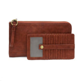 The Karina combines sleek styling with uber organization in beautiful antique-looking cinnamon colored vegan leather! This bag has the ultimate versatility, as it can be worn as a crossbody, a clutch, or a wristlet. The bonus wallet, which includes credit card slots, ID windows, a zippered change pocket, and a billfold, will keep you organized and can be carried separately!


MAIN BAG: 9"H x 6"W x 1"D



Removable and adjustable crossbody strap 21"-26" with lobster claw clasps

Removable long wristlet strap