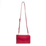 The Karina combines sleek styling with uber organization in beautiful antique-looking wild berry colored vegan leather! The ultimate in versatility, this bag can be worn as a crossbody, carried as a clutch or as a wristlet.&nbsp; The included bonus wallet with credit card slots, id windows, zippered change pocket, and billfold will keep you organized on the go and can be carried separately!


MAIN BAG: 9"H x 6"W x 1"D



Removable and adjustable crossbody strap 21"-26" with lobster claw clasps

Removable lo