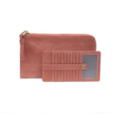 The Karina combines sleek styling with uber organization in beautiful antique-looking clay pink vegan leather! This bag has the ultimate versatility, as it can be worn as a crossbody, a clutch, or a wristlet. The bonus wallet, which includes credit card slots, ID windows, a zippered change pocket, and a billfold, will keep you organized and can be carried separately!


MAIN BAG: 9"H x 6"W x 1"D



Removable and adjustable crossbody strap 21"-26" with lobster claw clasps

Removable long wristlet strap 7" lon