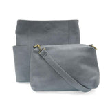 Casual and carefree crossbody in super soft pebble grain vegan leather! Our Kayleigh bucket bag in a beautiful dusty blue color comes with a smaller bag in the same color that can be carried inside or used alone! The convenient side pockets of this bucket bag can carry your water bottle, phone, or glasses.&nbsp;




11" W X 11.25" H X 3.5"
Magnetic Snap Closure
2 open and 1 zipper interior pockets
2 exterior open pockets and 1 back zipper pocket
12- 18" adjustable drop and detachable crossbody strap with lo