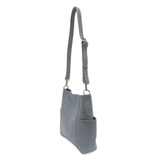 Casual and carefree crossbody in super soft pebble grain vegan leather! Our Kayleigh bucket bag in a beautiful dusty blue color comes with a smaller bag in the same color that can be carried inside or used alone! The convenient side pockets of this bucket bag can carry your water bottle, phone, or glasses.&nbsp;




11" W X 11.25" H X 3.5"
Magnetic Snap Closure
2 open and 1 zipper interior pockets
2 exterior open pockets and 1 back zipper pocket
12- 18" adjustable drop and detachable crossbody strap with lo