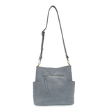 Casual and carefree crossbody in super soft pebble grain vegan leather! Our Kayleigh bucket bag in a beautiful dusty blue color comes with a smaller bag in the same color that can be carried inside or used alone! The convenient side pockets of this bucket bag can carry your water bottle, phone, or glasses.&nbsp;




11" W X 11.25" H X 3.5"
Magnetic Snap Closure
2 open and 1 zipper interior pockets
2 exterior open pockets and 1 back zipper pocket
12- 18" adjustable drop and detachable crossbody strap with lo