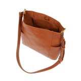 Brown leather handbag with a shoulder strap on a white background