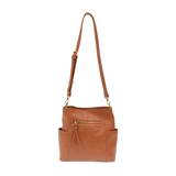 Brown leather handbag with a shoulder strap on a white background