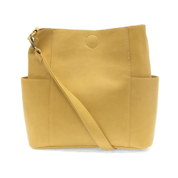 Casual and carefree crossbody in super soft pebble grain vegan leather! Our Kayleigh bucket bag in a beautiful butter yellow comes with a smaller bag that can be carried inside or used alone! The convenient side pockets of this bucket bag can carry your water bottle, phone or glasses. 


11