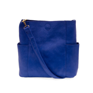 Casual and carefree crossbody in super soft pebble grain vegan leather! Our Kayleigh bucket bag in a stunning cobalt blue&nbsp;comes with a smaller bag that can be carried inside or used alone! The convenient side pockets of this bucket bag can carry your water bottle, phone or glasses.&nbsp;


11" W X 11.25" H X 3.5"
Magnetic Snap Closure
2 open and 1 zipper interior pockets
2 exterior open pockets and 1 back zipper pocket
12- 18" adjustable drop and detachable crossbody strap with lobster claw clasps
Brus