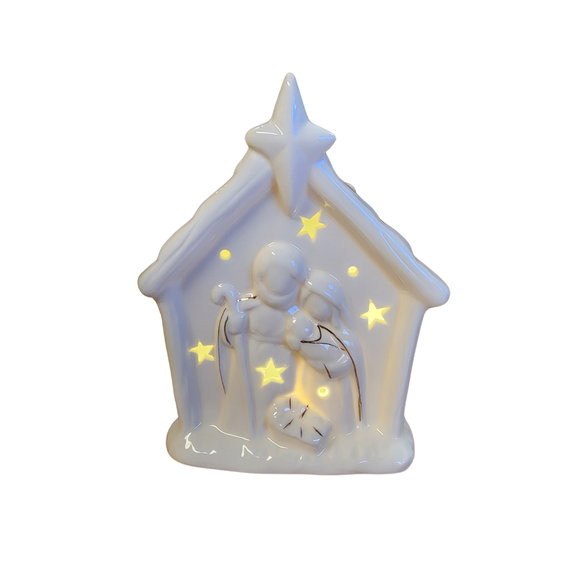 This pretty white ceramic nativity has a beautiful scene of the holy family with a few gold accents. There are several stars and circles cutouts that light up when you turn the switch on the bottom on. A perfect little reminder of the reason for the season!

4.5