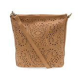 This slouchy bucket bag is fashioned in soft tan vegan leather accented with a feminine, delicate laser cut pattern reminiscent of eyelet lace for a luxe boho look. A top zip closure keeps your belongings secure with enough space for everything you need to carry on a daily basis. The back zipper pocket keeps your phone or keys in easy reach, and the adjustable shoulder strap can be worn as a crossbody or shoulder bag.


Dimensions: 11 in. H x 11.5 in. W x 3.5 in.
Top zip closure
Adjustable and removable sho