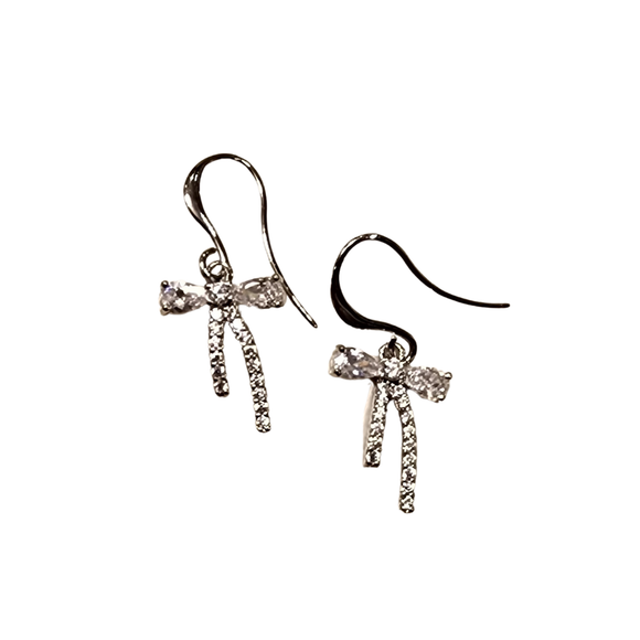 Beautiful sparkling bow earrings are trendy accessories for every occasion. These sweet little bows have sparkling crystals bows loops, catching the light perfectly. These earrings will add a small touch of sparkle to any occasion.

Details: ~ Earring length is approx 1
