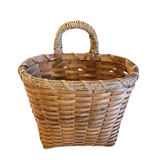 This medium chipwood basket will look great hanging on a wall, a door, and even a door knob! Stick in some ivy or flowers that you can change out each season for versatile decorating!

16" H x 12.5" W x 8.5" D
