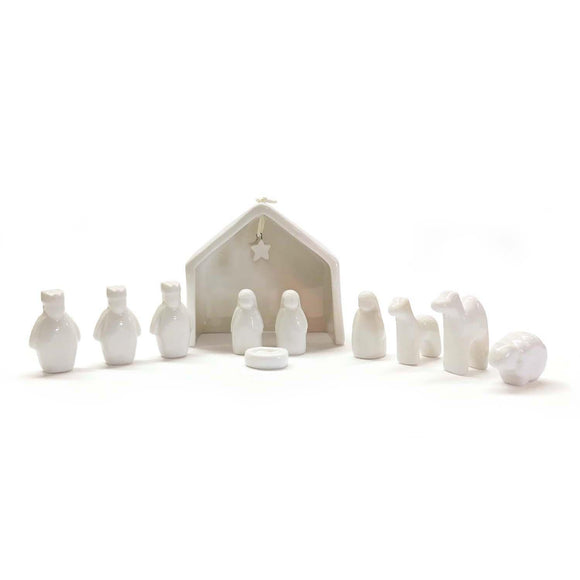 This porcelain miniature nativity will be sure to be a keepsake throughout the years! Inside the gift box is the stable with hanging star, Mary, Joseph, Jesus, the three kings, a shephard, donkey, camel and sheep.

Figurines: from 1/2