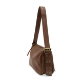 Ready to add a slouchy cool bag to your wardrobe rotation? Look no further than the Morgan in russet! The top zip closure conceals a roomy interior that has space for a large wallet, max size phone, glasses, make-up bag and more. Created in softly tumbled vegan leather and accented with bold golden buckles that make a statement, this soft shape will take you from the office to the party and back again!

Dimensions: 7.5 in. H X 11.5 in. W X 4.5 in. D
Top zip closure
Adjustable shoulder strap: 12 - 18.5 in. d