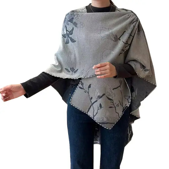 Cozy Cashmere Like Travel Wrap This one size fits all reversible loop wrap, drapes over and through shoulder loop to stay in place. Accents any outfit, casual or dressy. It feels and looks like cashmere. A beautiful layering piece!

60% Poly, 40% Acrylic.

Dry clean or hand wash cold with light colors, lay flat to dry, iron on lowest setting if need, do not bleach.