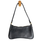Meet Nicolette, our sleek, curvy shadow grey colored crossbody pochette with a minimalist style. Featuring soft sculptural curves in tumbled vegan leather, this bag is closed with a brass zipper that encloses 3 interior compartments to keep your cards, cash, keys and phone stowed neatly. The gleaming brass rings open to swap out the two included shoulder straps. A short strap for dressier looks and a longer adjustable crossbody strap when you want to go hands free. The Nicolette will add a stylish pop to yo