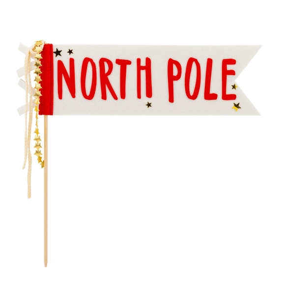 Add a festive touch to your holiday celebrations with the North Pole Felt Pennant. Featuring the red letters of 