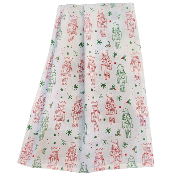 Add a little holiday cheer with this cheerful towel. Red and green nutcrackers are on a white background with stars, holly and dots for a festive look for your kitchen this year!

27