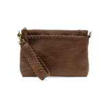 This sleek top zip clutch crafted in a saddle colored buffalo grain vegan leather is accented with whipstitching to give it a modern western style. It looks great with jeans or a dress and easily goes from day to night as the Oakley can be carried as a clutch, a wristlet or a crossbody bag with the included detachable wristlet strap with whipstitched details, an adjustable and removable shoulder strap.


Dimensions: 7 in. H x 10 in. W x 3 in. D
Top zip closureWristlet strap with whipstitching: 8 in. long
Ad