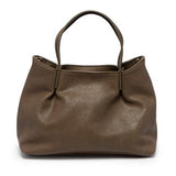 Accented by deep pleats this slouchy satchel bag crafted in softly tumbled olive colored vegan leather gives a modern yet feminine vibe to your look. Stay organized with three interior compartments including one zipper and two magnetic snap closures, with space for your wallet, phone, cosmetics and more. Featuring both top handles and a removable shoulder strap, this versatile crossbody bag will accent all your looks from casual to dressy.
Product Details
Dimensions: 8.25 in. H x 10.5 in. W x 4 in. D
3 Inte