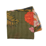 This olive scarf features beautiful florals and leaves in cream, orange, fuchsia, gold, and navy.

180" L x 88" W

100% Polyester