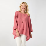 Relaxed and effortlessly chic, the Peyton Frayed Edge Poncho is a versatile layering piece designed for easy, everyday wear. Featuring a soft drape and wide, flowy silhouette in a beauitful desert clay color, this poncho is finished with subtle frayed edge detailing for a casual, lived‑in feel. Lightweight and comfortable, it layers beautifully over tanks or tees and pairs effortlessly with denim for a polished yet laid‑back look.

Materials: Cotton.

One size fits most.
