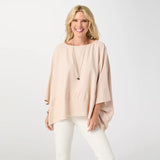Relaxed and effortlessly chic, the Peyton Frayed Edge Poncho is a versatile layering piece designed for easy, everyday wear. Featuring a soft drape and wide, flowy silhouette in a beauitful sand color, this poncho is finished with subtle frayed edge detailing for a casual, lived‑in feel. Lightweight and comfortable, it layers beautifully over tanks or tees and pairs effortlessly with denim for a polished yet laid‑back look.

Materials: Cotton.

One size fits most.