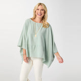 Relaxed and effortlessly chic, the Peyton Frayed Edge Poncho is a versatile layering piece designed for easy, everyday wear. Featuring a soft drape and wide, flowy silhouette in a beauitful sea glass color, this poncho is finished with subtle frayed edge detailing for a casual, lived‑in feel. Lightweight and comfortable, it layers beautifully over tanks or tees and pairs effortlessly with denim for a polished yet laid‑back look.

Materials: Cotton.

One size fits most.