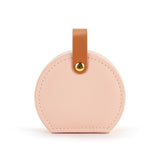 A beautiful gift for yourself or a friend, this traveling jewelry case is pink with a brown strap closure. Inside there is room for your jewelry for a short weekend or a couple of weeks!

Foam, metal, paper, polyester fiber, polyurethane

2.5" h x 4.5" w x 4.5" d