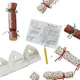 Add festive flair to your holiday gatherings with this party cracker in a beautiful red plaid! Perfect for Christmas parties, they bring a cheerful pop to your celebrations, making every moment memorable and bright.&nbsp;

Each contains a die, a game, and a tissue crown

7" H x 1.5" Dia