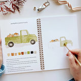 The Autumn Watercolor Workbook includes 12 fall-themed illustrations with an example of the finished painting, step-by-step instructions, and a lightly illustrated sketch for you to paint. It's just like a coloring book, but with watercolor! &nbsp;Enjoy this peaceful painting hobby on your own, with children, or with friends. Makes a wonderful gift and is perfect for artists of any age.

12 beginner-friendly illustrations on thick 120lb watercolor paper

Lay-flat pages with spiral binding for hassle-free pa