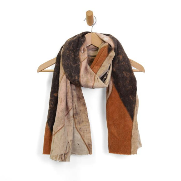 Oh-So-Soft! Our Russet Waves of Comfort is a beautiful scarf that almost looks like a wavy stained glass pattern with diferent tans, browns and rust running through it!

180