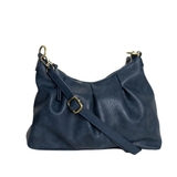 The Sasha Hobo is made of gently tumbled vegan leather in navy, accented with soft pleats and closed with a brass zipper. This crossbody is so versatile with 2 different interchangeable shoulder straps included, just open the gleaming brass rings to change from a short shoulder strap to a longer adjustable crossbody strap.
Product Details
Dimensions: 9.5 in. H x 12.5 in. W x 3.5 in. D
Top zip closure
Brass plated hardware
Logo zipper pulls
Opening brass rings to change between the included shoulder straps
1