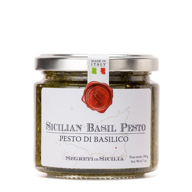 The classic basil pesto is made with a Sicilian touch. Add a dollop to your morning eggs or pizza sauce. Elevate your sandwich game, or put some in your pasta for an easy meal! You can also create an appetizer plate to remember with this amazing pesto. Made with the finest ingredients, this pesto stands out from the rest because of its rich flavor.   Ingredients: Basil, Extra Virgin Olive Oil, Cheese, Almonds, Sea Salt, Pistachios, and Acidifying Agent (Citric Acid).