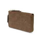 Cool, stylish, and organized, too! This cocoa wallet has it all! 12 credit card pockets, 2 change pockets, and 2 billfold pockets, all wrapped in lush tumbled vegan leather, lined with rugged washed canvas, and accented with our new Joy Logo zipper pull. The removable strap lets you carry it as a compact wristlet, too!



Dimensions: 7.75 in. W x 4 in. H x .5 in. D

Full Zip-Around Closure

Exterior Zip Pocket on Spine

Removable Wristlet Strap

12 Credit Card Pockets

2 Billfold Pockets

Interior Zipper

C
