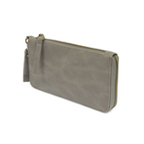 Cool, stylish, and organized, too! This grey wallet has it all! 12 credit card pockets, 2 change pockets and 2 billfold pockets all wrapped in a dark oak&nbsp;colored vegan leather, lined with rugged washed canvas, and accented with our new Logo zipper pull. The removable strap lets you carry it as a compact wristlet, too!


Dimensions: 7.75 in. W x 4 in. H x .5 in. D
Full Zip Around Closure
Exterior Zip Pocket on Spine
Removable Wristlet Strap
12 Credit Card Pockets
2 Billfold Pockets
Interior Zipper
Coin 