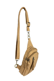 Our best-selling Skyler is now in soft luscious wheat colored vegan suede, perfect for Fall. This organized sling brings a cozy vibe to your look and will look great layered over your favorite chunky sweater. With space for your large phone, keys, wallet, lip gloss and more, you will be able to carry everything you need with hands free convenience


Product Details
Dimensions: 8 in. H x 5.5 in. W x 2.25 in. D
Removable and adjustable convertible strap drop: 20-30 in.
Top zip closure
Exterior front zip pocke