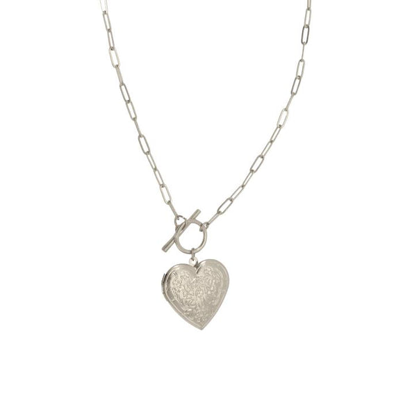 This sweet heart locket has a link 16+ chain with the trending fake toggle closure at the top of the heart. The heart has beautiful scrolling on it and opens to put two pictures inside. It has a lobster clow hook/closure at the top of the chain.

The necklace is 19