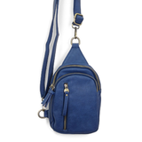 Blending uptown chic with downtown cool, the Skyler sling bag in bright navy is made in pretty raspberry vegan leather! A convertible strap lends versatility, while a front zip pocket offers practical storage for your necessities. It is the perfect companion for a night out on the town or a fun day trip!


8" h x 5.5" w&nbsp; x 2.25" d
Removable and adjustable convertible strap 20"-30" drop
Zippered top closure
Exterior front zip pocket
2 exterior zip compartments
4 interior credit card pockets
Brass plated