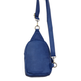 Blending uptown chic with downtown cool, the Skyler sling bag in bright navy is made in pretty raspberry vegan leather! A convertible strap lends versatility, while a front zip pocket offers practical storage for your necessities. It is the perfect companion for a night out on the town or a fun day trip!


8" h x 5.5" w&nbsp; x 2.25" d
Removable and adjustable convertible strap 20"-30" drop
Zippered top closure
Exterior front zip pocket
2 exterior zip compartments
4 interior credit card pockets
Brass plated
