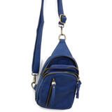 Blending uptown chic with downtown cool, the Skyler sling bag in bright navy is made in pretty raspberry vegan leather! A convertible strap lends versatility, while a front zip pocket offers practical storage for your necessities. It is the perfect companion for a night out on the town or a fun day trip!


8" h x 5.5" w&nbsp; x 2.25" d
Removable and adjustable convertible strap 20"-30" drop
Zippered top closure
Exterior front zip pocket
2 exterior zip compartments
4 interior credit card pockets
Brass plated