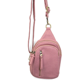 Blending uptown chic with downtown cool, the Skyler sling bag is made in pretty raspberry vegan leather! A convertible strap lends versatility, while a front zip pocket offers practical storage for your necessities. It is the perfect companion for a night out on the town or a fun day trip!


8" h x 5.5" w&nbsp; x 2.25" d
Removable and adjustable convertible strap 20"-30" drop
Zippered top closure
Exterior front zip pocket
2 exterior zip compartments
4 interior credit card pockets
Brass plated hardware
100% 