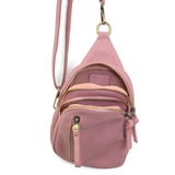 Blending uptown chic with downtown cool, the Skyler sling bag is made in pretty raspberry vegan leather! A convertible strap lends versatility, while a front zip pocket offers practical storage for your necessities. It is the perfect companion for a night out on the town or a fun day trip!


8" h x 5.5" w&nbsp; x 2.25" d
Removable and adjustable convertible strap 20"-30" drop
Zippered top closure
Exterior front zip pocket
2 exterior zip compartments
4 interior credit card pockets
Brass plated hardware
100% 