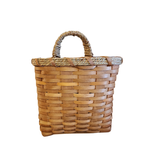 This small chipwood basket will look great hanging on a wall, a door, and even a door knob! Stick in some ivy or flowers that you can change out each season for versatile decorating!

14" H x 9.5" W x 6.5" D

Chipwood