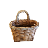 This small chipwood basket will look great hanging on a wall, a door, and even a door knob! Stick in some ivy or flowers that you can change out each season for versatile decorating!

14" H x 9.5" W x 6.5" D

Chipwood